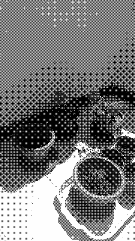 Two capuchinas with flowers, some pots with just soil and one with a sprout